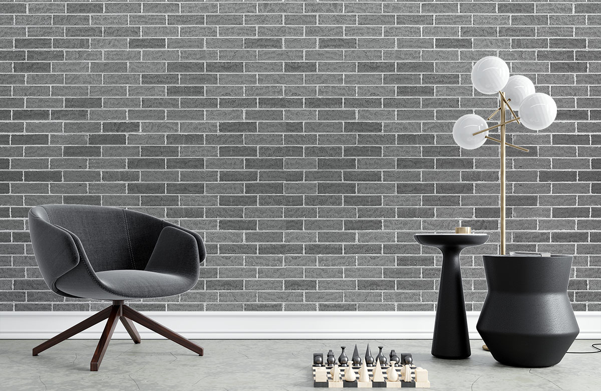 grey-brick-design-Singular design large mural-with-chair
