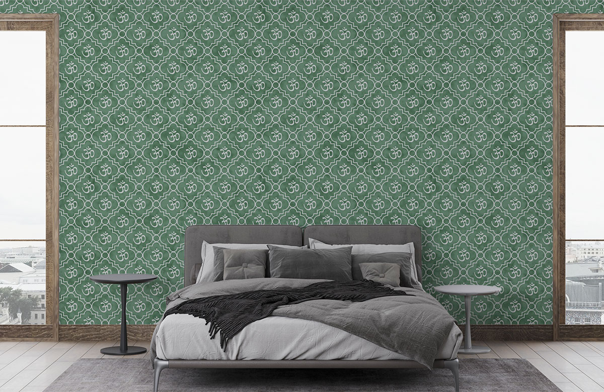 om-pattern-in-green-wallpapers-in-front-of-bed